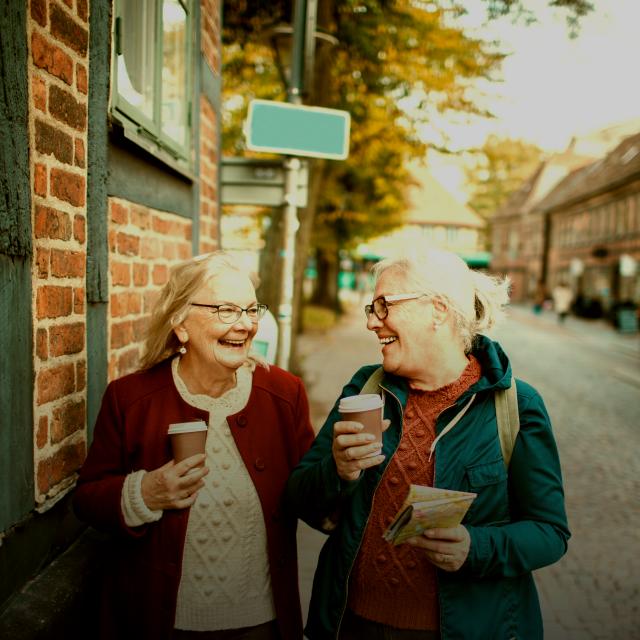 Two women talking on the street